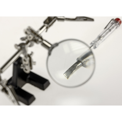 The helping hand with loupe and clamps