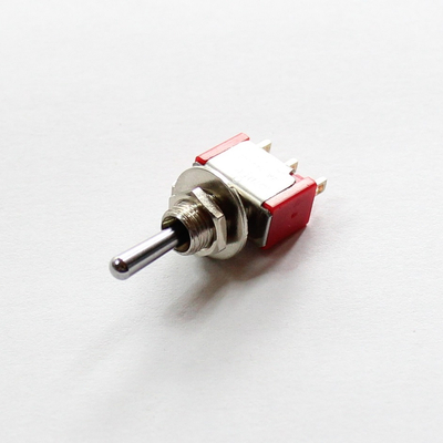 Miniature rocker switch (on)/off/(on) with center position