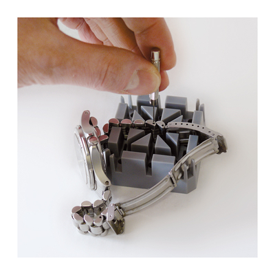 Calcinations tape holding block with pen